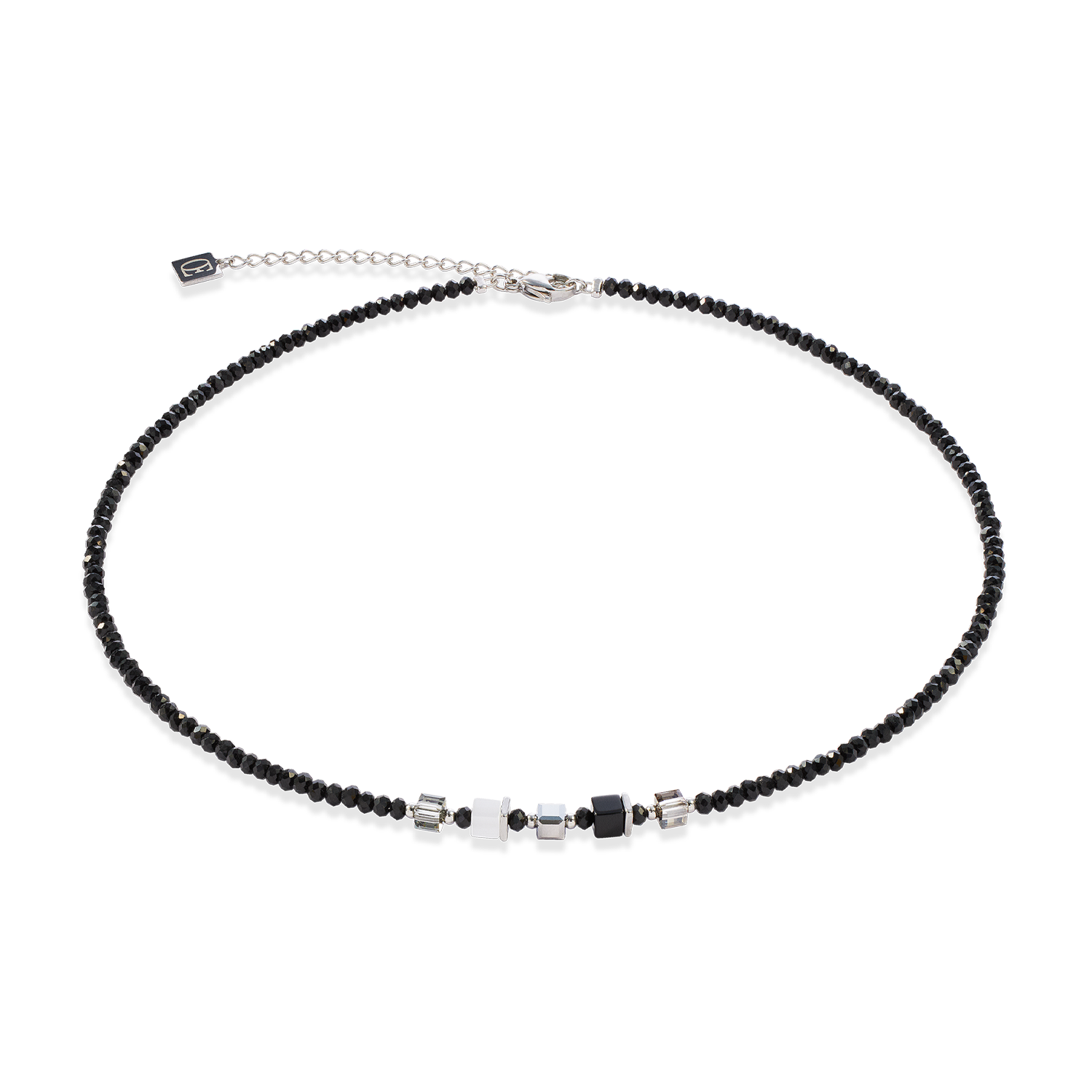 Necklace with black beads and silver clasp on a white background