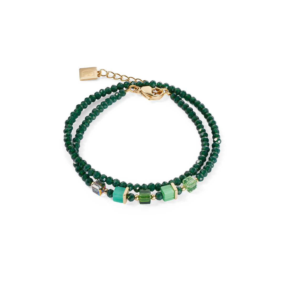 Green beaded bracelet with gold accents on a white background