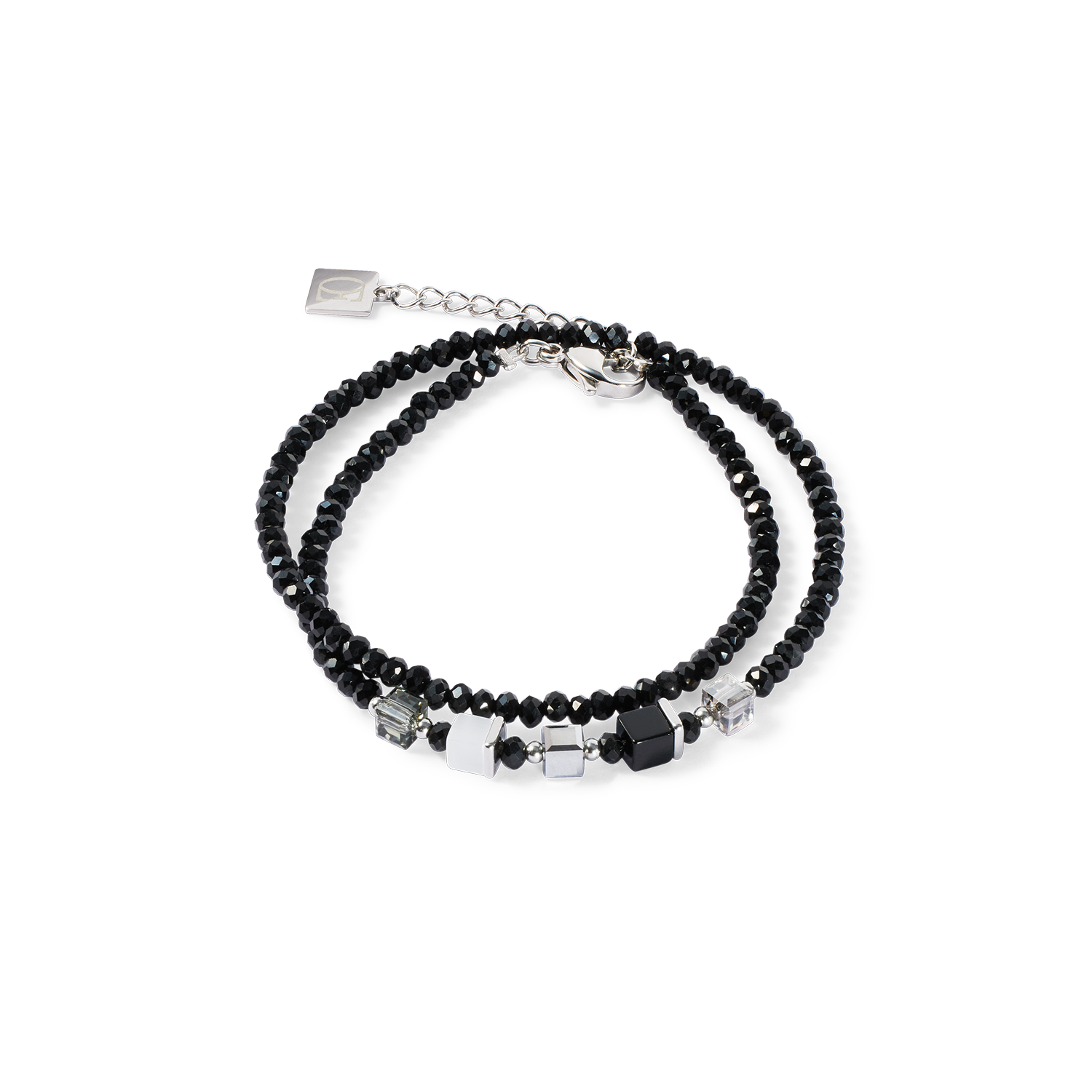Black beaded bracelet with silver accents on a white background