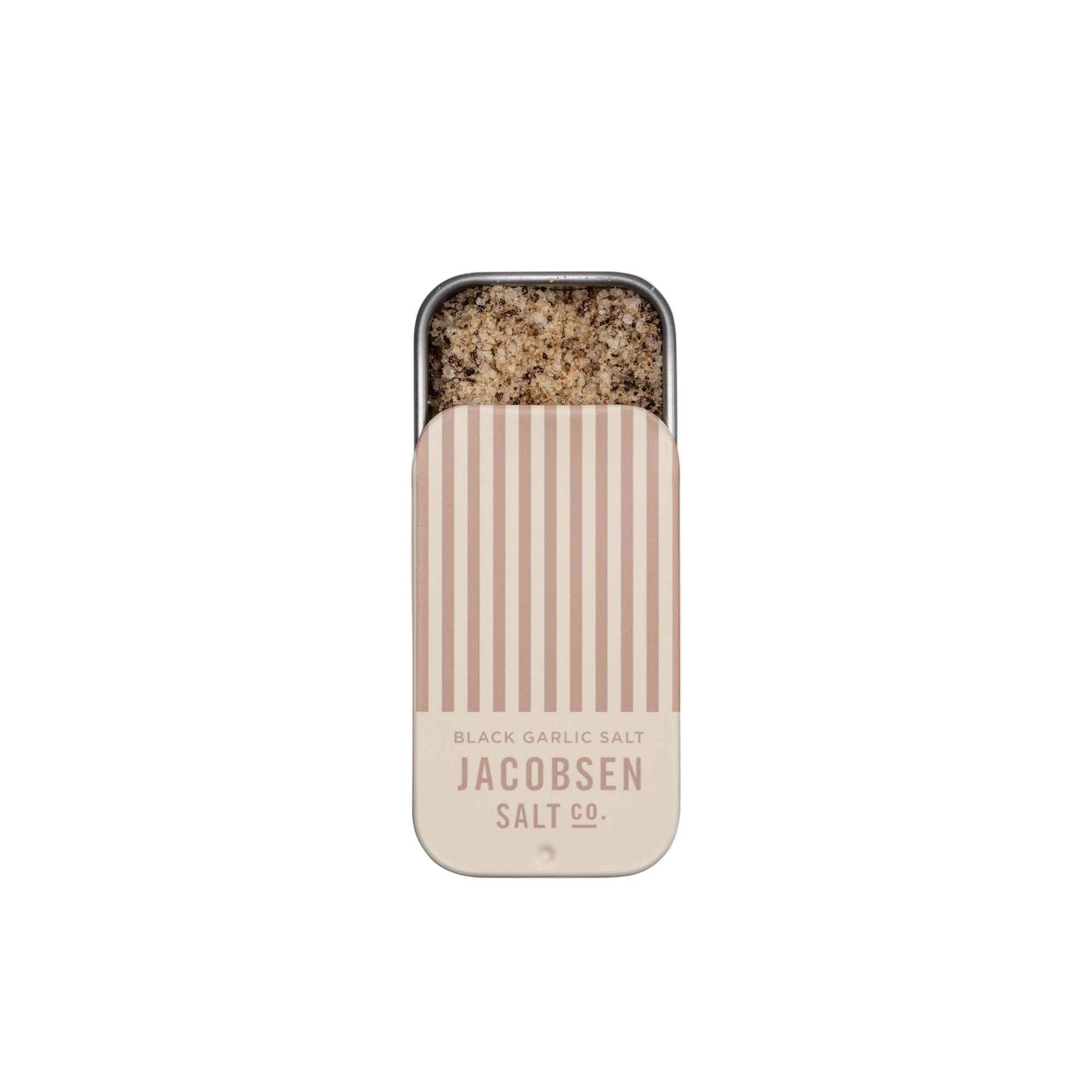 Tin of Jacobsen Salt Co. black garlic salt on a light gray background