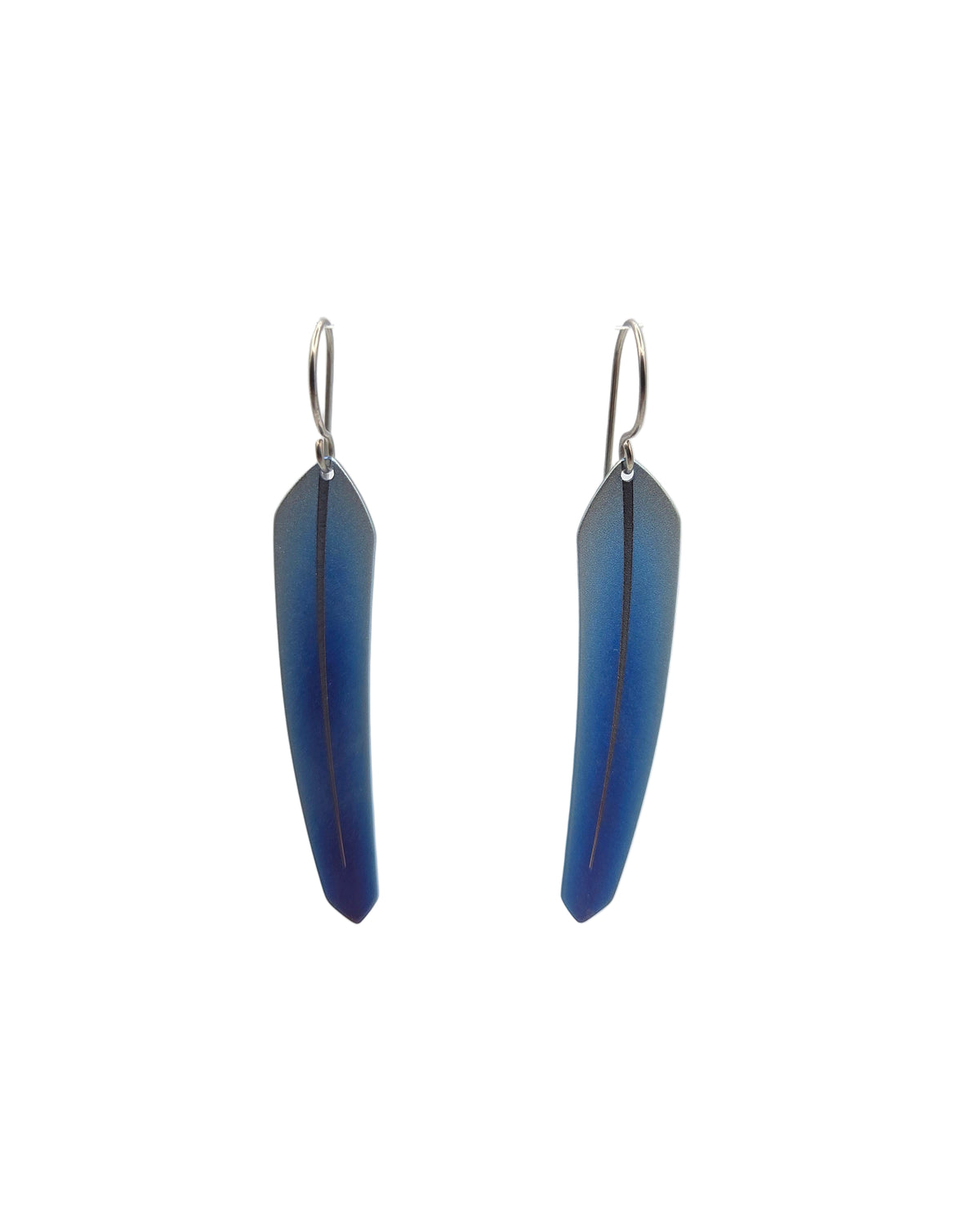Pair of blue feather earrings on a white background