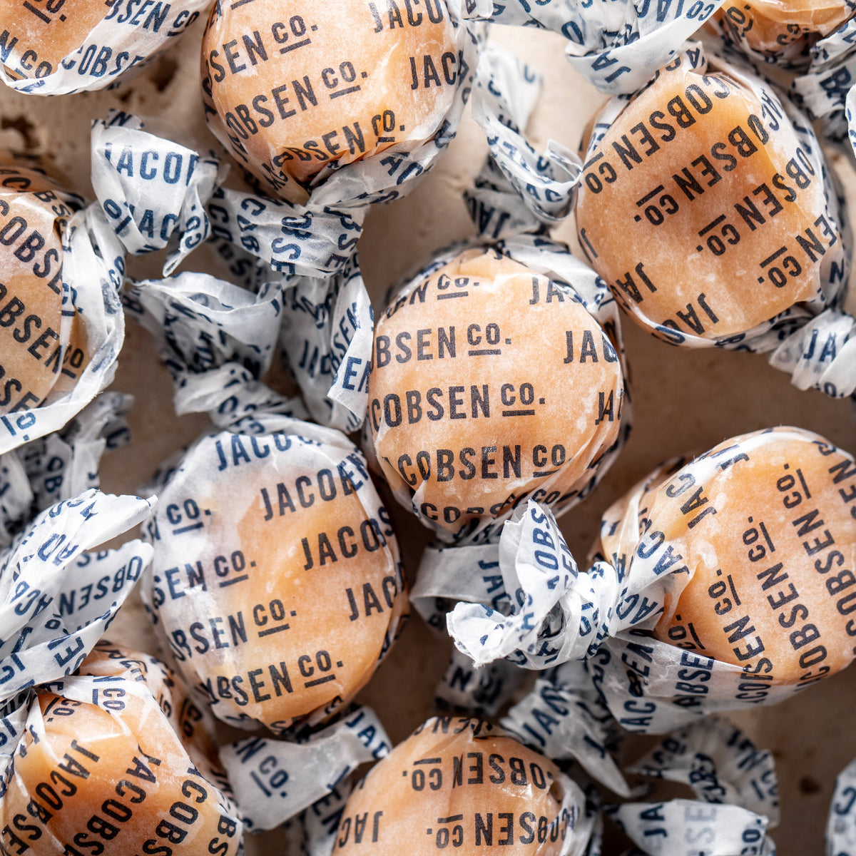 Jacobsen Co. taffy candies in clear wrappers with visible branding.