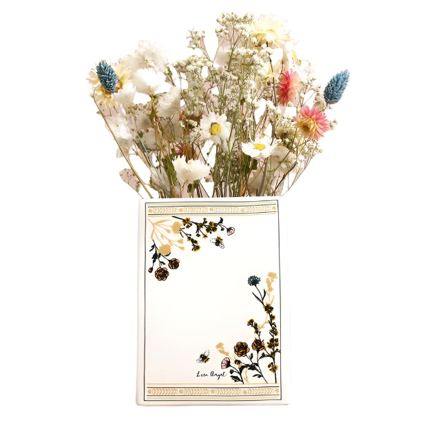 Vase with dried flowers