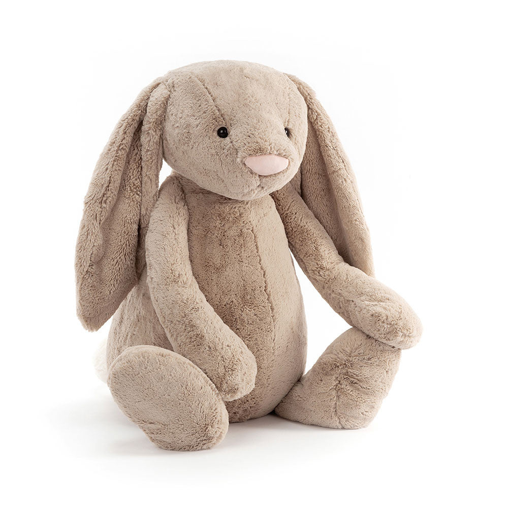Plush bunny toy on a white background