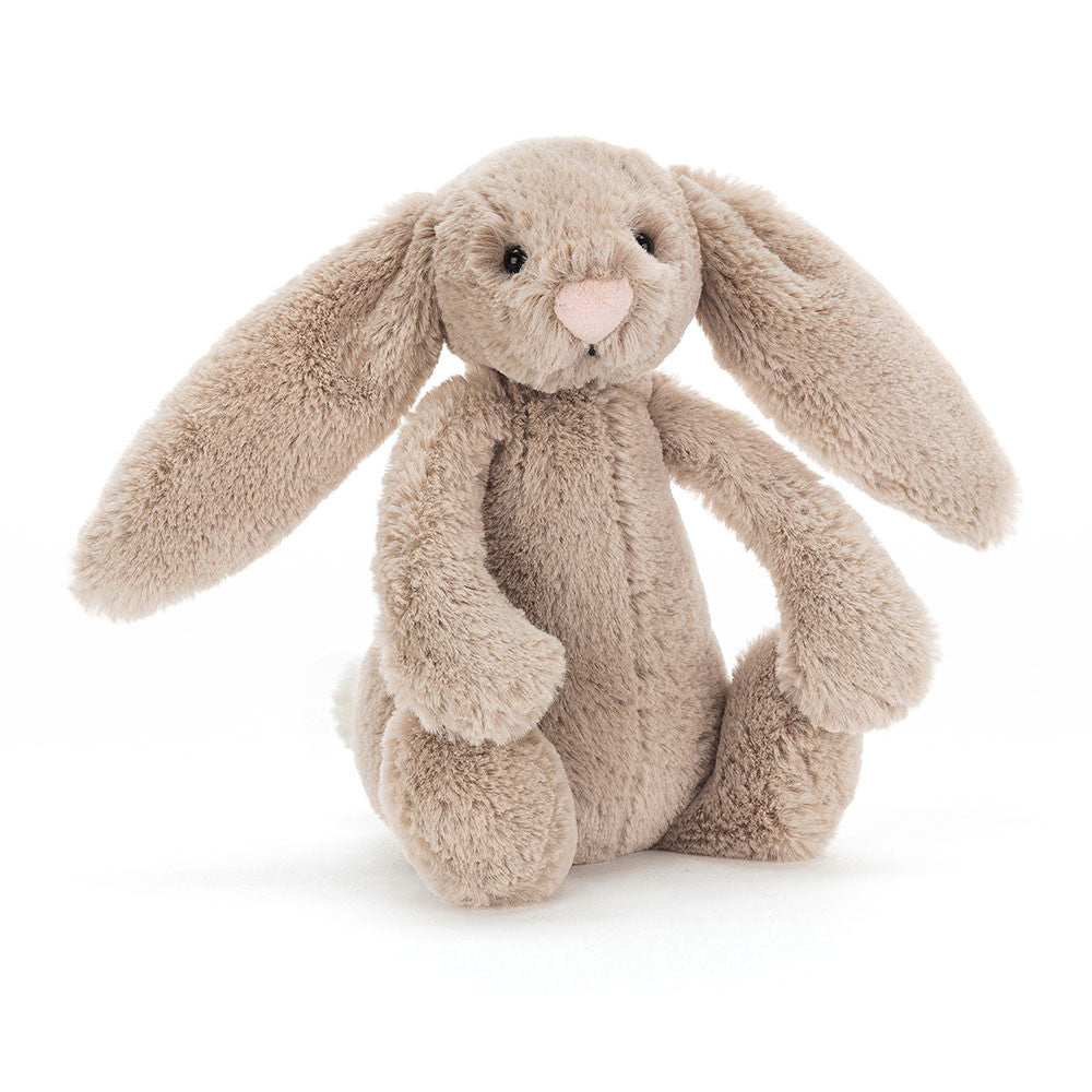 Plush bunny toy on a white background