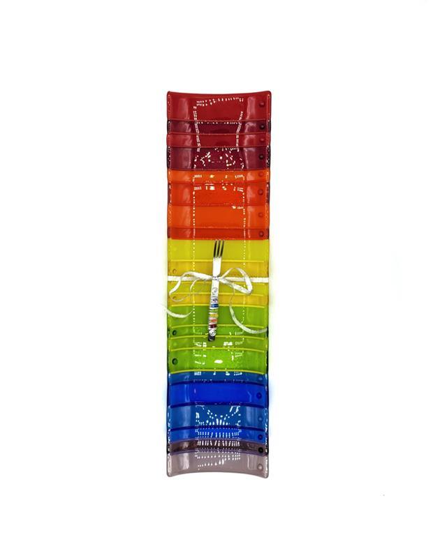 very long rainbow pattern fused glass dish