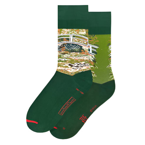 Green socks with a bridge design on a white background