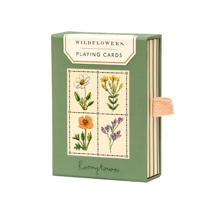 Playing card set with wildflower design on a green box