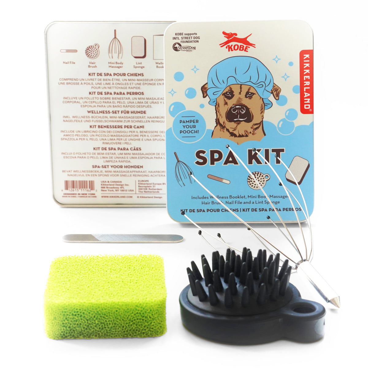 Dog grooming kit with tools and packaging on a white background