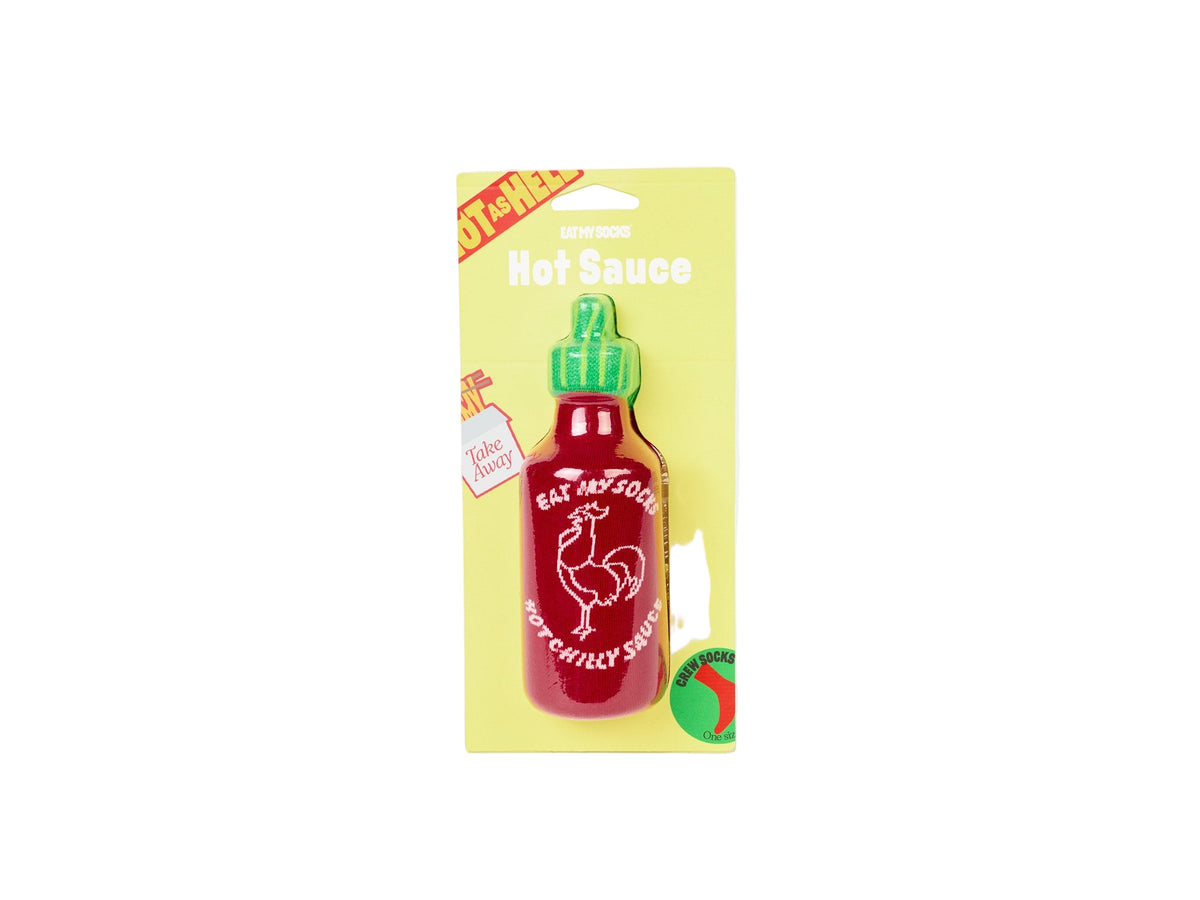 Hot sauce bottle with yellow packaging and white text.