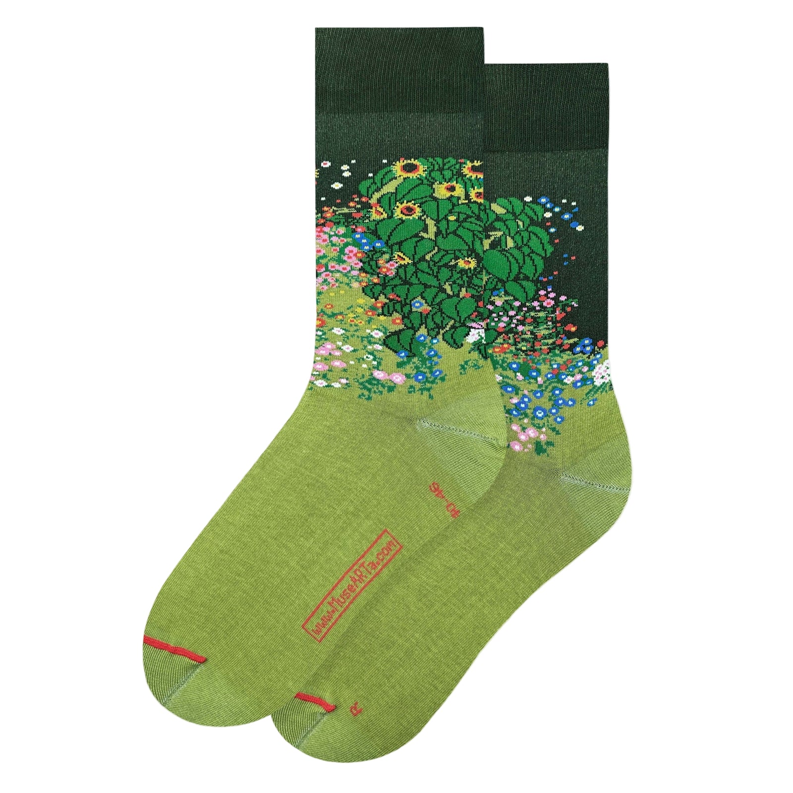 Green socks with floral design on a white background