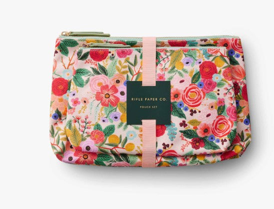 Two floral patterned pouches with pink strap on a white background
