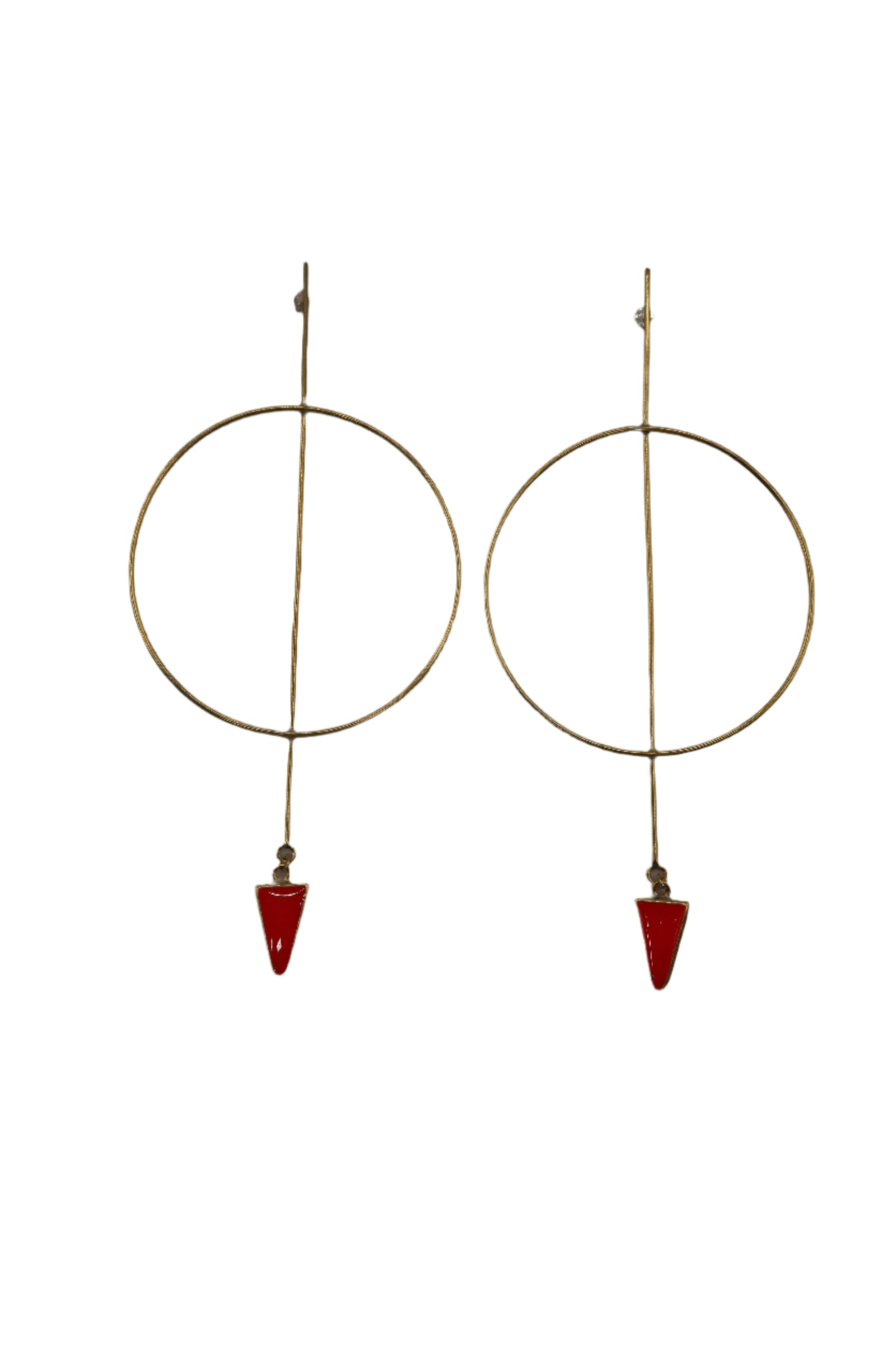 Large gold colored circle earring with red triangular stones