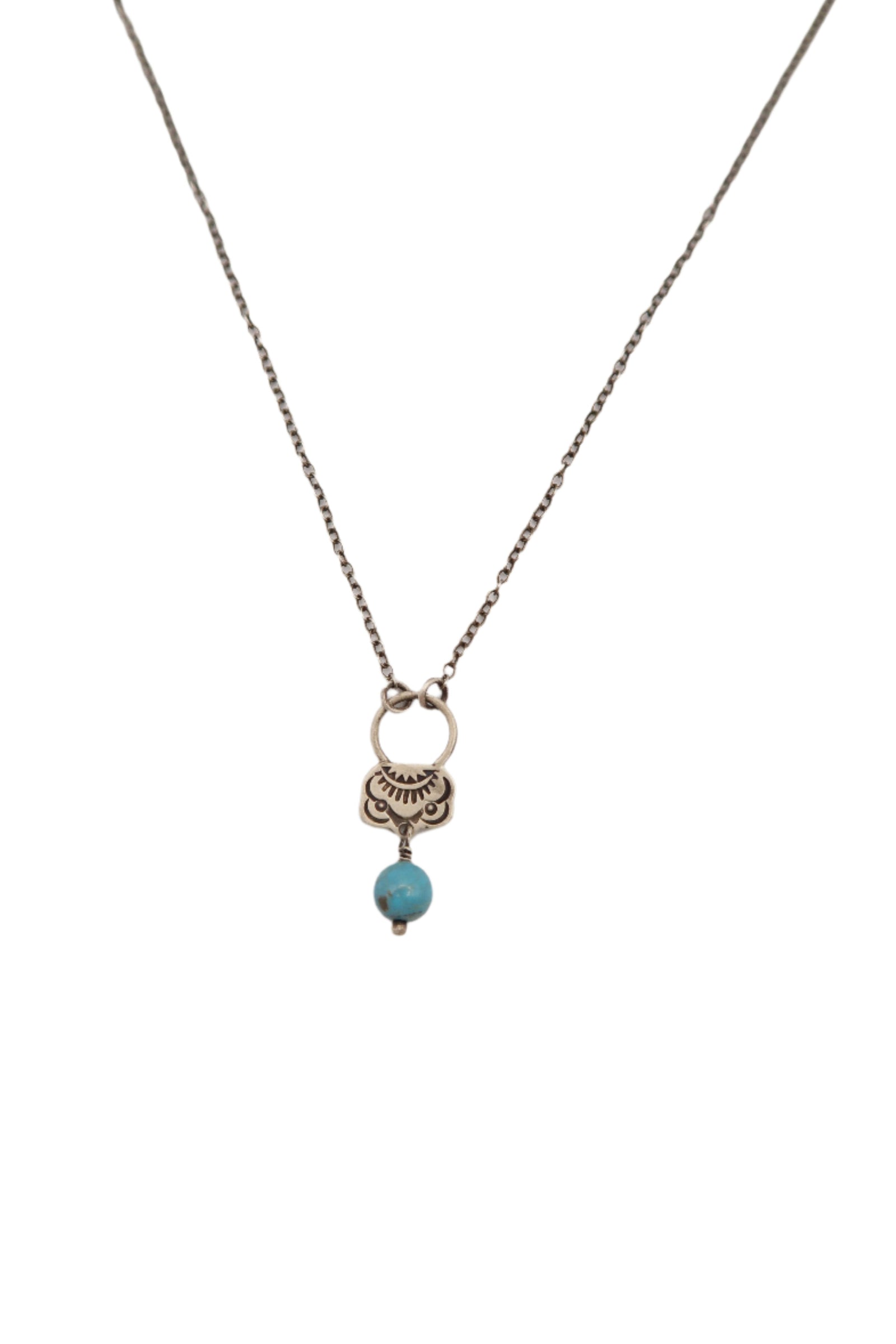 Necklace with a turquoise bead