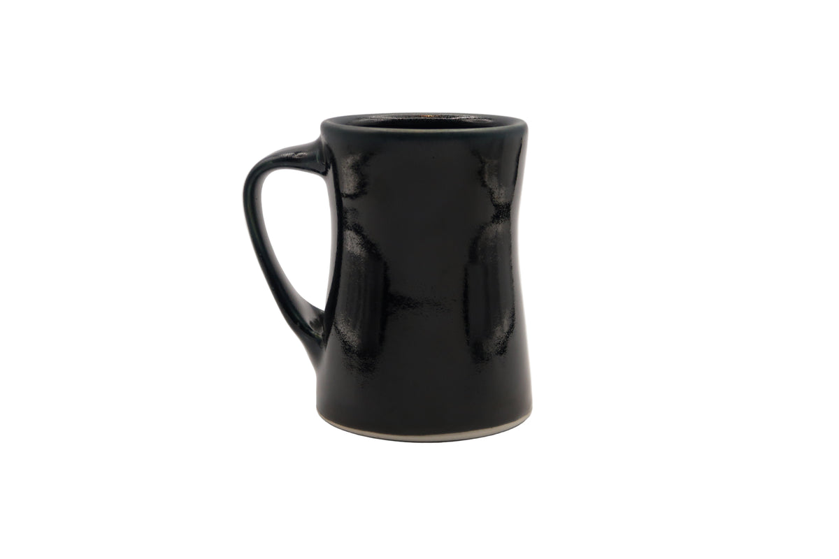 Black ceramic mug on a white background