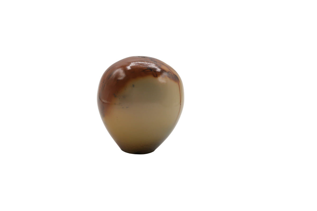 Marbled brown and beige egg shaped ceramic vase on a white background