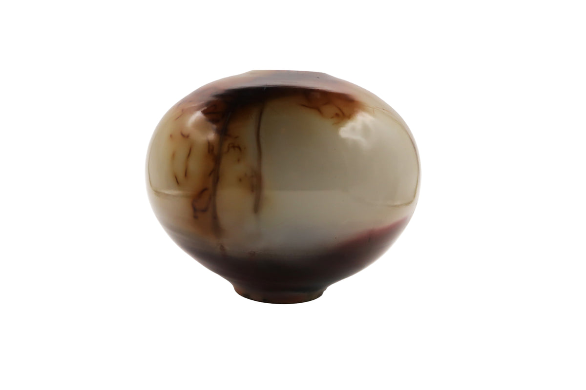 Ceramic round vase with brown and black gradient on a white background