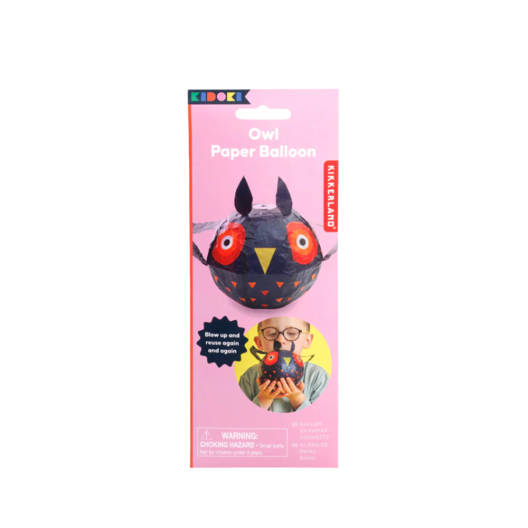Owl-shaped paper balloon packaging with pink background