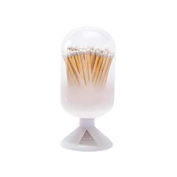 White matches holder with matches on a white background