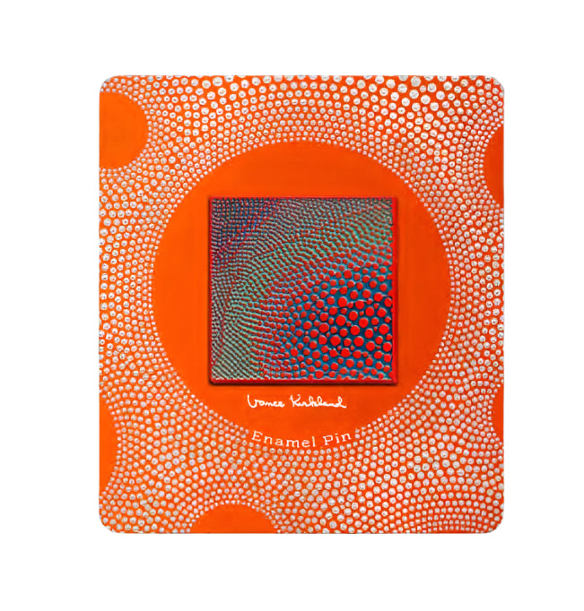 Enamel pin packaging with orange and white pattern on a white background