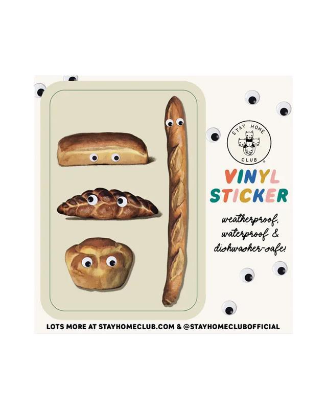 A vinyl sticker with a design of bread rolls with eyes, on a white background with the brand 'Stay Home Club' mentioned below.