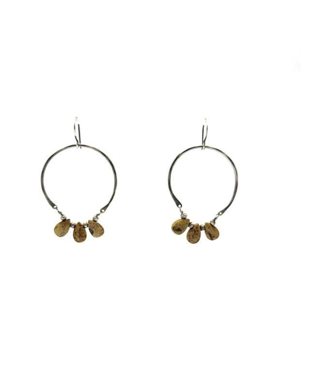 A pair of silver hoop earrings with rustic picture jasper drops