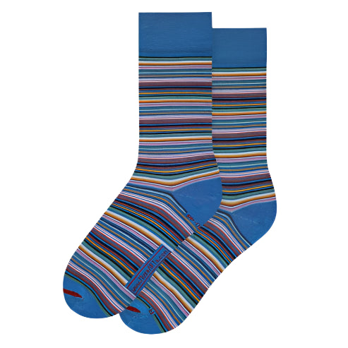 Blue sock with multicolored stripes on a white background