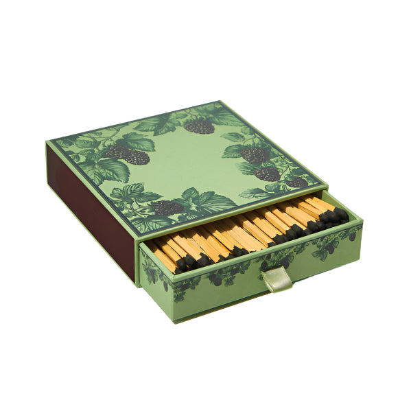 Matchbox with blackberry design on a white background