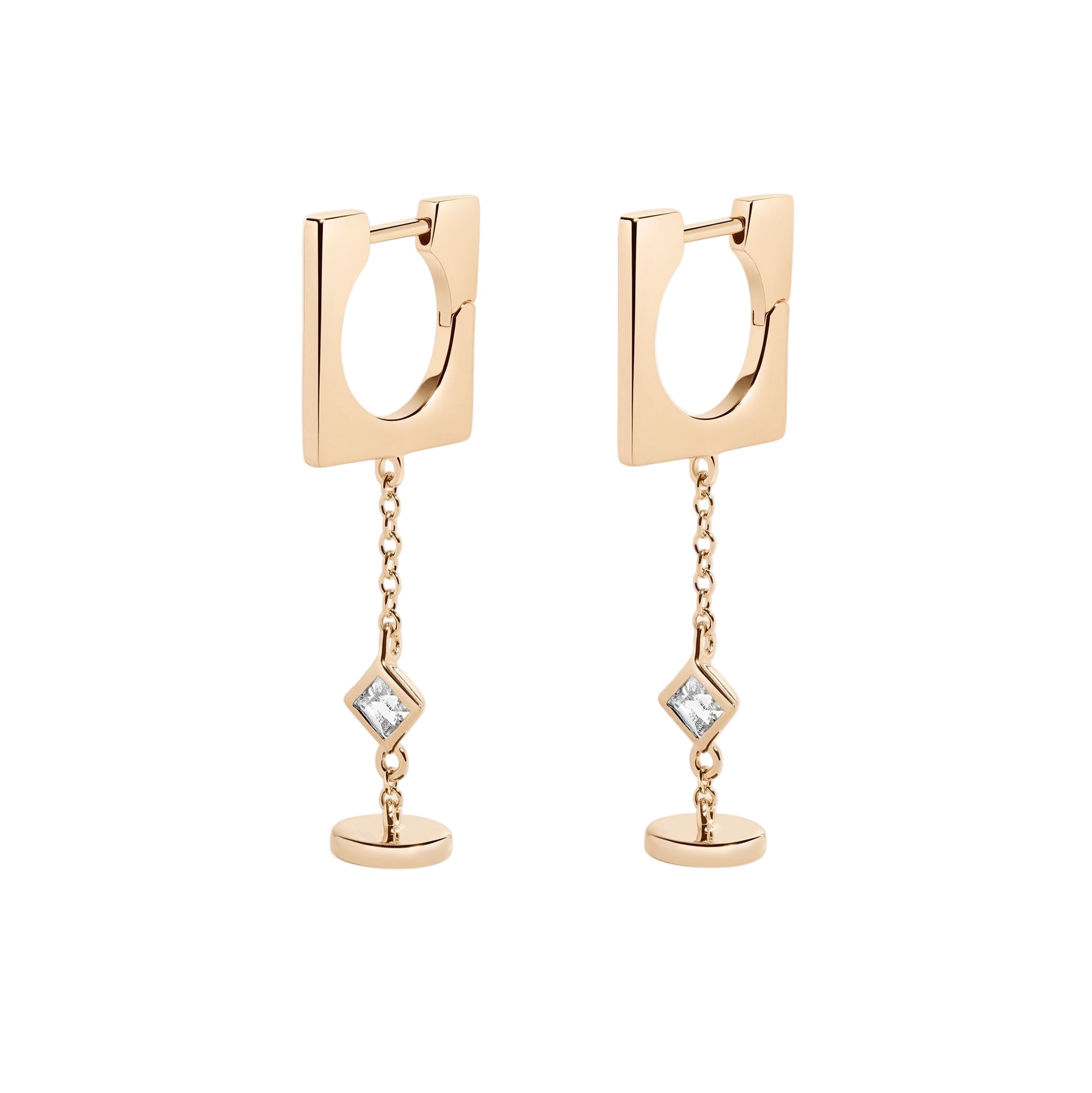 Gold hoop earrings with chain drops and gemstones on a white background
