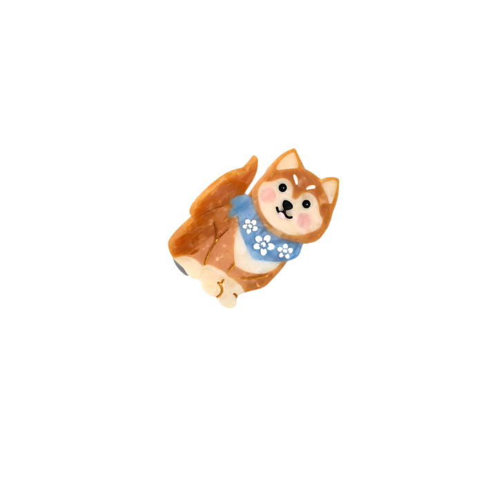 Cartoon dog with a blue bandana on a white background