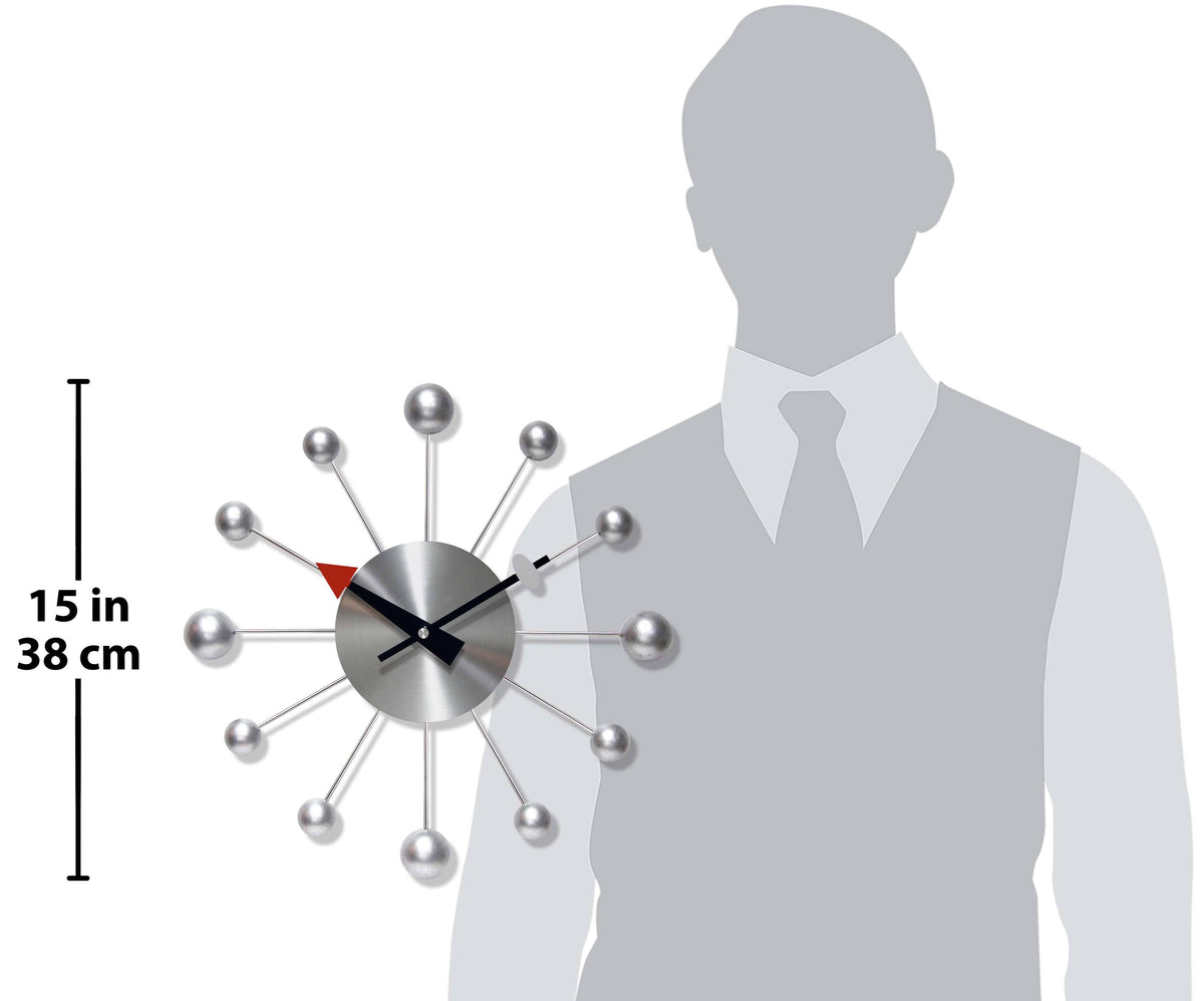 Modern wall clock with a silhouette of a person for scale on a white background