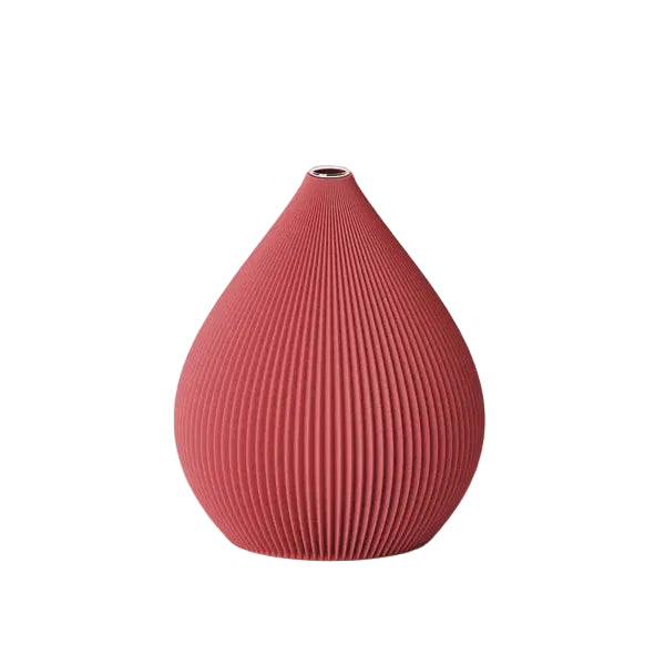 Red ribbed vase on a white background