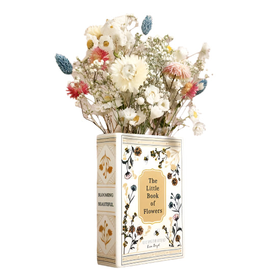 Book-shaped vase with flowers against 