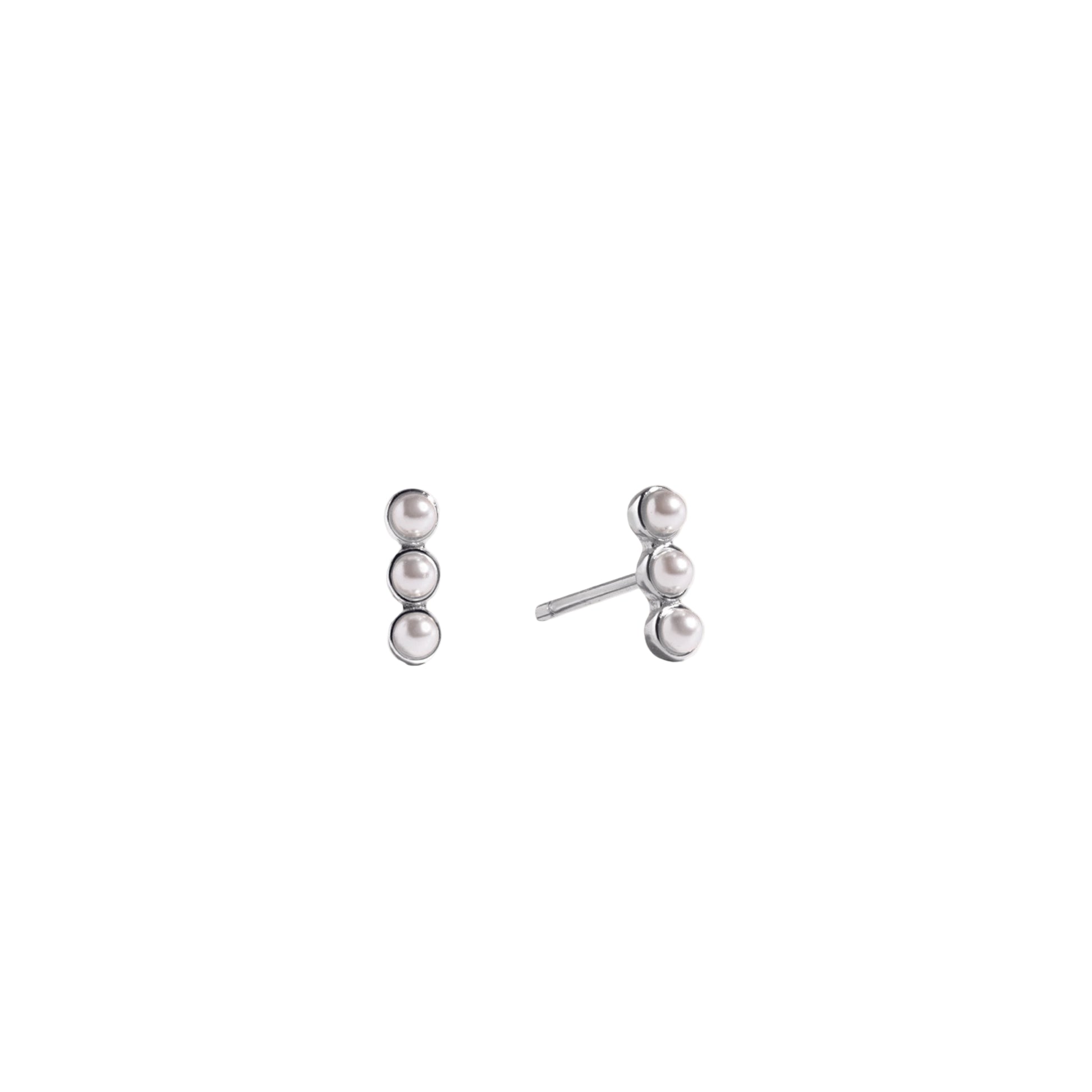 Pair of pearl earrings on a white background