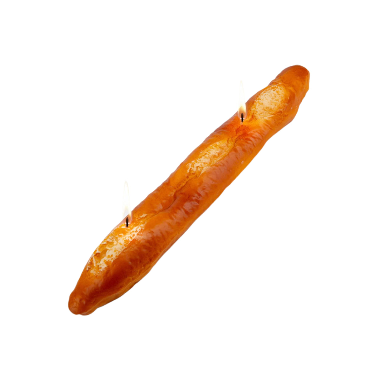 Baguette-shaped candle with three lit wicks on a white background