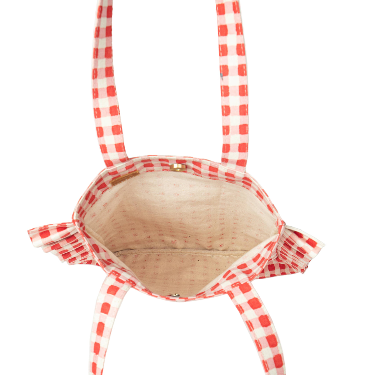 Inside of Red and white checkered bikini top on a white background