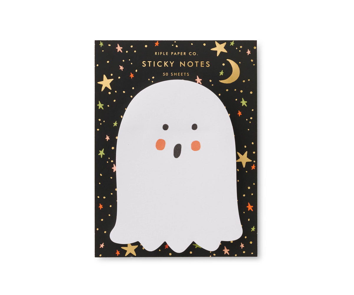 Sticky notes with a ghost design on a black background, featuring stars and moons.