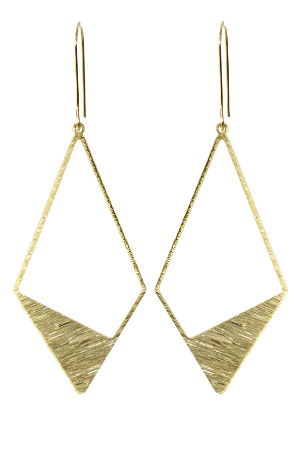 Gold geometric earrings on a white background