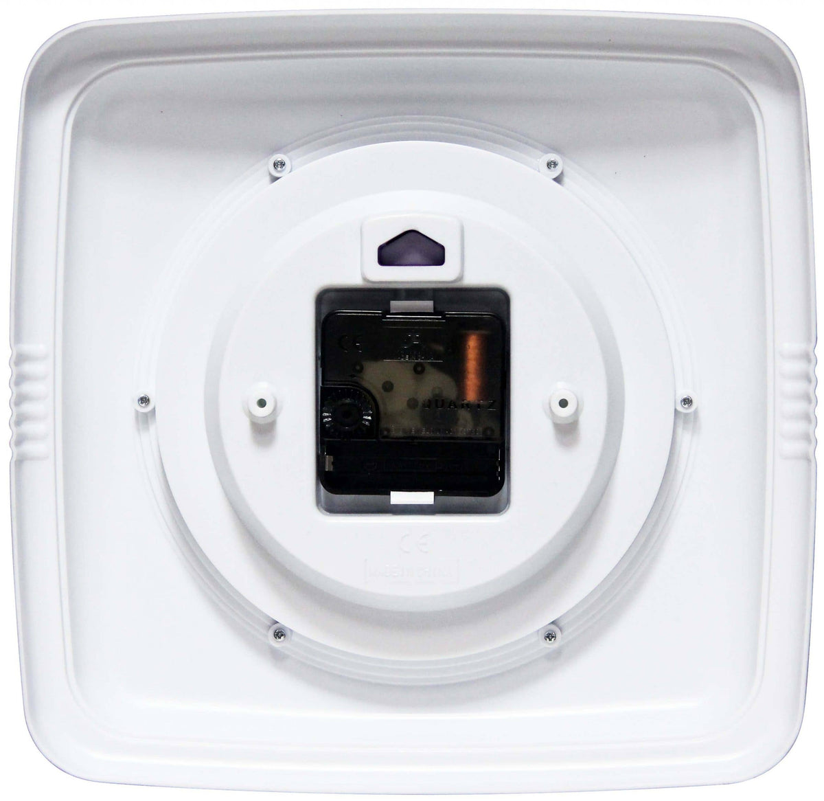 Back of square clock with mechanical area and where to put the batteries on a white background