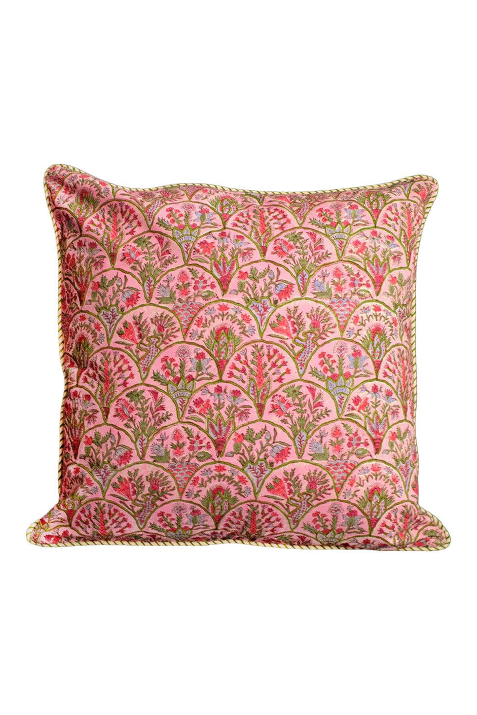Decorative pillow with pink and green floral pattern on a white background