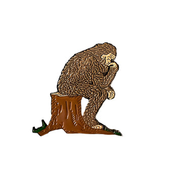 bigfoot sitting on a tree stump pin