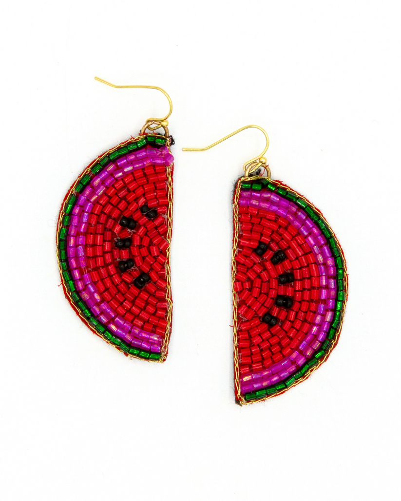 Watermelon slice beaded earrings on a white background