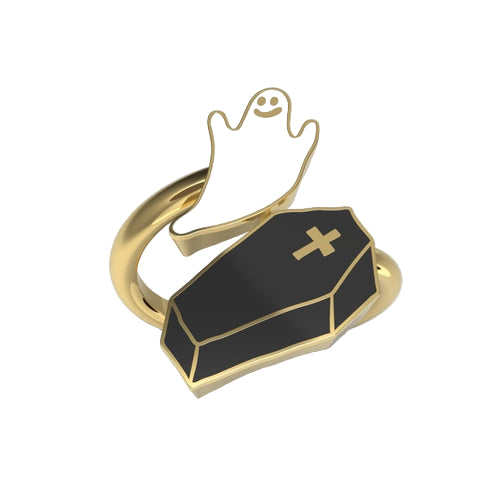 Gold ring with a black coffin and ghost design on a white background