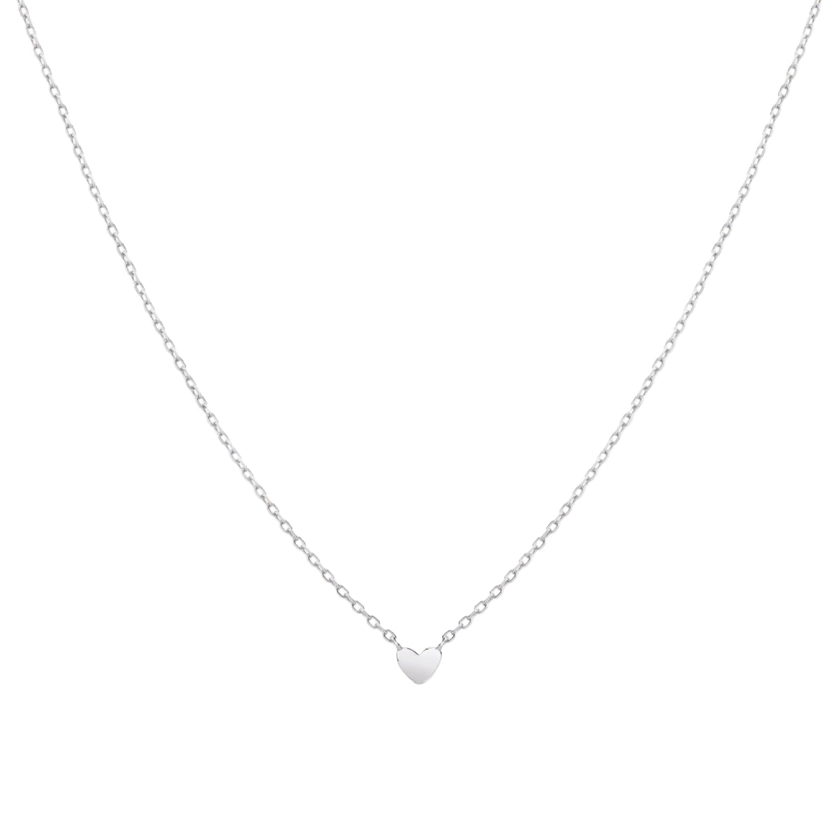Silver necklace with a heart pendant on a light gray background