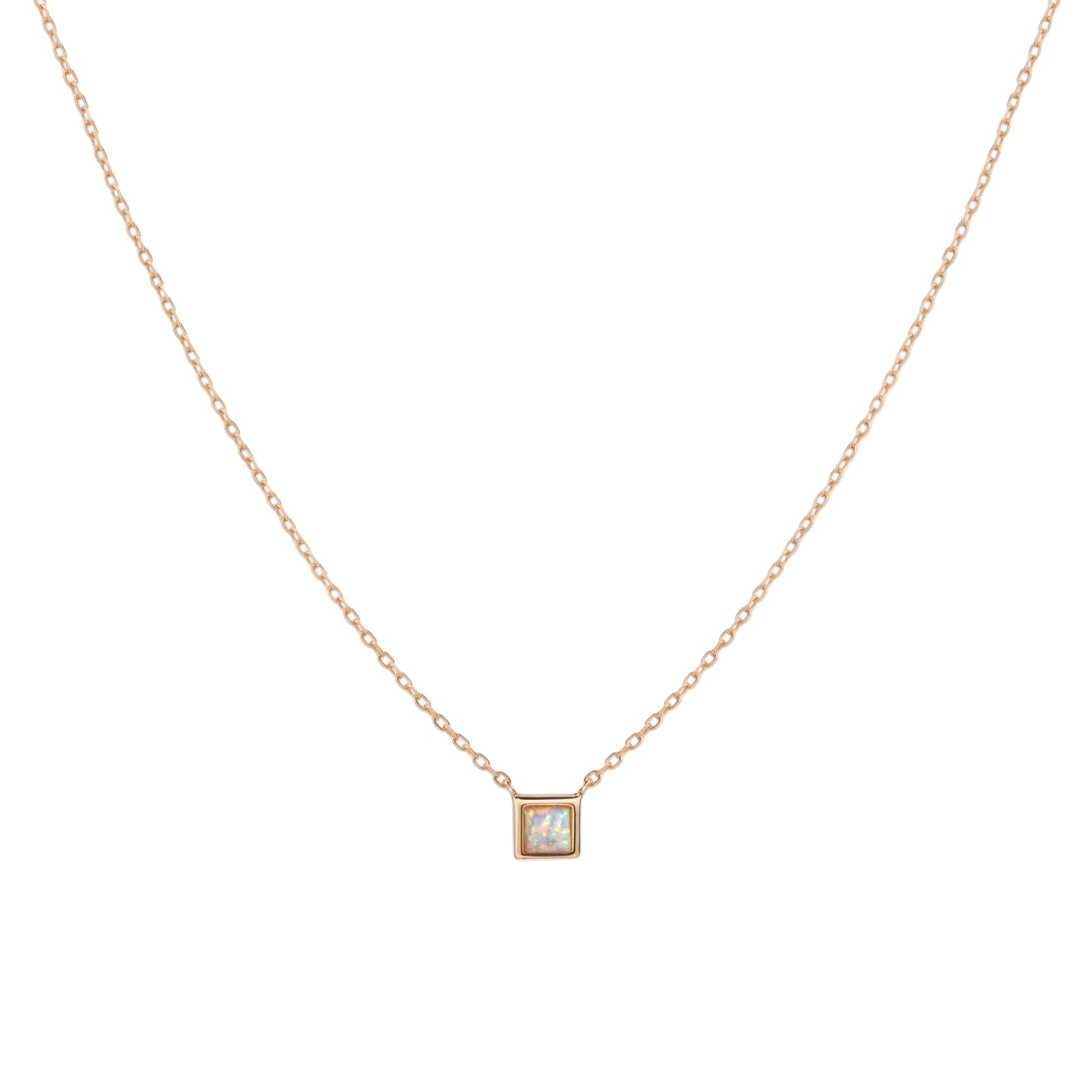 gold necklace with a square-cut opal pendant on a white background