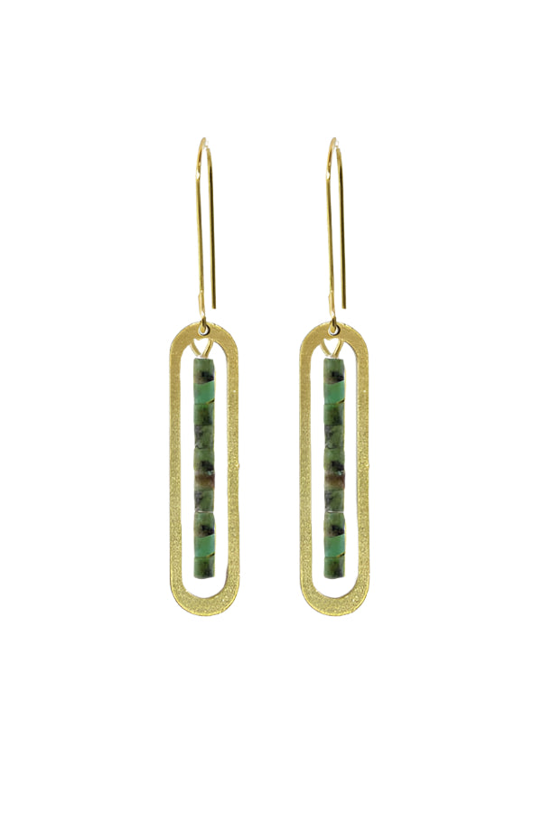 Gold earrings with green stone inlays on a white background
